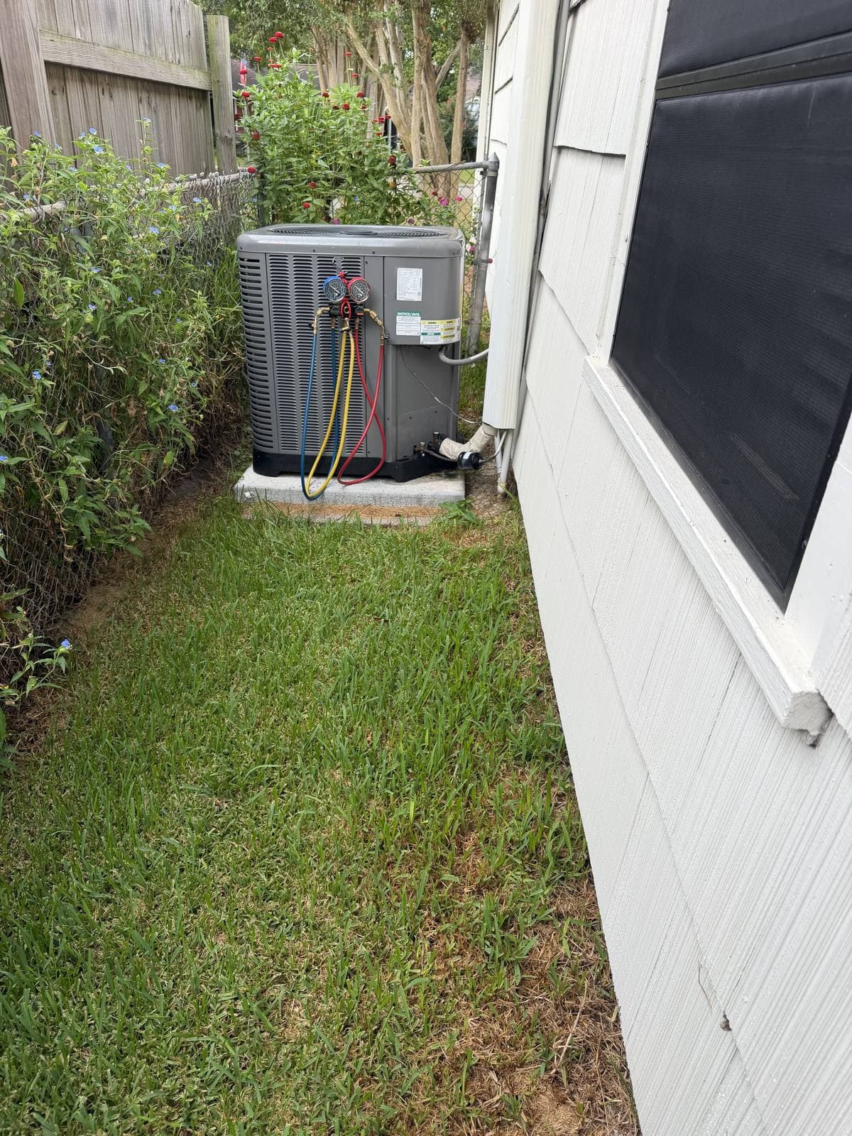 Mabry's Air Conditioning & Heating technician's gauges and tools during an AC repair in Alvin, TX